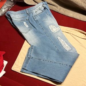 Rafaella light denim jeans with lace embellishments.